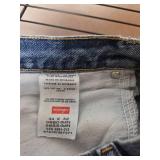 Dockers Relaxed Fit Khakis 34x32, Wrangler and Rustler Jeans 34x32, and Large Swim Trunks