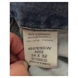 Dockers Relaxed Fit Khakis 34x32, Wrangler and Rustler Jeans 34x32, and Large Swim Trunks