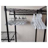 15 Swivel Top Plastic Hangers and 12 White Clip In Pants Hangers