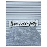 Love Never Fails Rustic Wall Sign