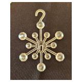 Vintage clear plastic snowflake ornaments, at least 70 years old, 2 inch width, total of 36