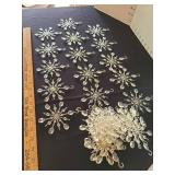 Vintage clear plastic snowflake ornaments, at least 70 years old, 4 inch width, total of 29