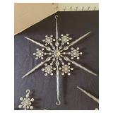 Vintage clear plastic snowflake ornaments, at least 70 years old, 8 and 13in width, total of 5