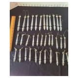 Vintage clear plastic icicle ornaments, at least 70 years old, 3 and 6in tall, total of 35