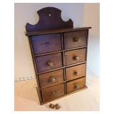 Primitive antique wooden eight drawer spice chest, 16x10.5x5.5. Two loose knobs included.