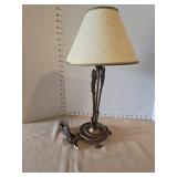 Vintage Art Deco table lamp with ornate bronze base and claw feet, 19in tall