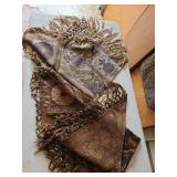 2 decorative fringed textile pieces/tablecloths