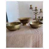 Vintage brass bowls and candle holders.