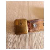 Vintage Pyrography wood box made for hosiery and garters and a leather Hickok belt monogrammed A