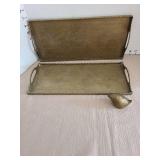 Vintage oriental brass serving tray with etched garden scene and a small brass bird
