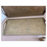 Vintage oriental brass serving tray with etched garden scene and a small brass bird