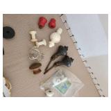 Brass doorknocker, old knobs, lamp harps, more.