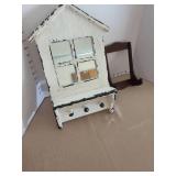 Rustic house-shaped wall mirror with hooks