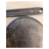 Vintage cast iron wall mount utensil holder, small Wagner cast iron skillet, Swett ladle, old saddle soap, more