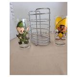 Two 1973 Warner Bros collector glasses and a stainless steel utensil holder