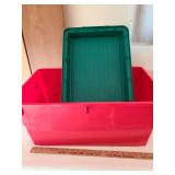 Red and green storage tote.