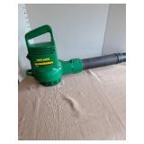 Electric Weed Eater brand ground sweeper.