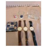 Russian nesting dolls, ICT mugs, shot glasses, pins, watches