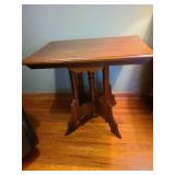 Antique Eastlake parlor table 26x29x20, has surface crack