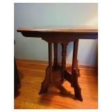 Antique Eastlake parlor table 26x29x20, has surface crack