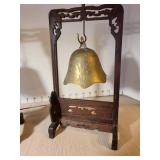 Vintage Asian brass bell gong with hand carved wooden stand, the one on the right missing the gong hammer