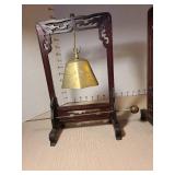 Vintage Asian brass bell gong with hand carved wooden stand, the one on the right missing the gong hammer