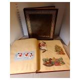 Two scrapbooks with vintage greeting card fronts