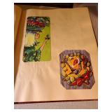 Two scrapbooks with vintage greeting card fronts