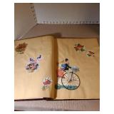 Two scrapbooks with vintage greeting card fronts