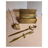 Brass letter rack, two letter openers, mouse note holder