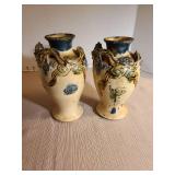 Pair of antique Japanese ceramic vases featuring molded three-clawed dragon design, 7in tall