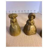 Brass Dutch girl bell with 2 boots as clapper. Other brass girl bells. Tallest is 5in.