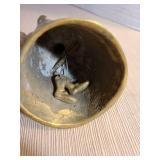 Brass Dutch girl bell with 2 boots as clapper. Other brass girl bells. Tallest is 5in.