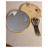Vintage Irice mirror in leather snsp case, celluloid mirror, vanity tray, brushes, more. Some damage to tray and box.
