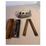 Antique Stanley 2ft folding ruler, Goodell-Pratt Co. 6in cast iron level, small ornate metal tape dispenser, ruler has been glued, see pic