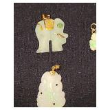 Jade jewelry pieces with 14 k gold