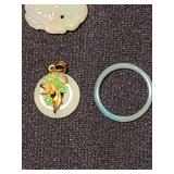 Jade jewelry pieces with 14 k gold