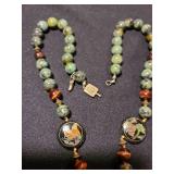 Vintage Jade and bead necklace with cloisonne and a carved Jade pendant, a beautiful design.