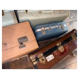 VINTAGE SUIT CASES X 7- AT