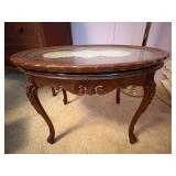 ANTIQUE OVAL WOODEN SIDE TABLE 27X21X19 W/ GLASS TOP & DOILY- UPB