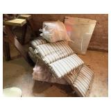 PILE OF OUTDOOR LAWN CHAIR CUSHIONS- BMT