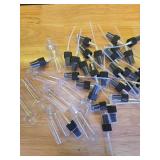 Roshtia 100 Pcs 2 oz Plastic Mini Spray Bottles with Black Cap Clear Empty Fine Mist Spray Bottles Refillable Liquid Container for Essential Oils Perfumes Travel Makeup - Retail: $36