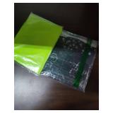 Neon Green flower balloons and a happy birthday table cloth