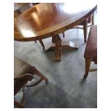 Mid-Century Round Dining Table Set with Chairs. Missing two wheels on one chair
