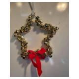 Gold Bell star Ornament with Red Bow