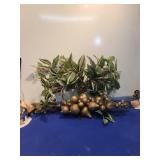 Elegant Holiday Centerpiece with Gold Ornaments and Artificial Foliage