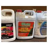 Shelf of Shop Chemicals - Large Bottles, Various Levels