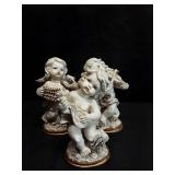 TRIO OF RESIN SMOOTH FINISH CHERUBS APPROXIMATELY 5 INCHES TALL TRIO OF RESIN SMOOTH FINISH CHERUBS APPROXIMATELY 5 INCHES TALL