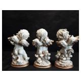 TRIO OF RESIN SMOOTH FINISH CHERUBS APPROXIMATELY 5 INCHES TALL TRIO OF RESIN SMOOTH FINISH CHERUBS APPROXIMATELY 5 INCHES TALL