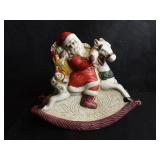 MUSICAL PORCELAIN SANTA FIGURINE APPROXIMATELY  7 INCHES TALL MUSICAL PORCELAIN SANTA FIGURINE APPROXIMATELY  7 INCHES TALL